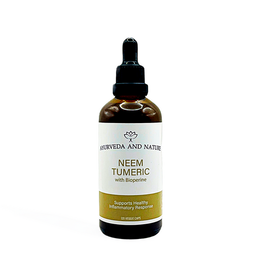 Bottle of Neem Turmeric extract from Ayurveda and Nature on a white background
